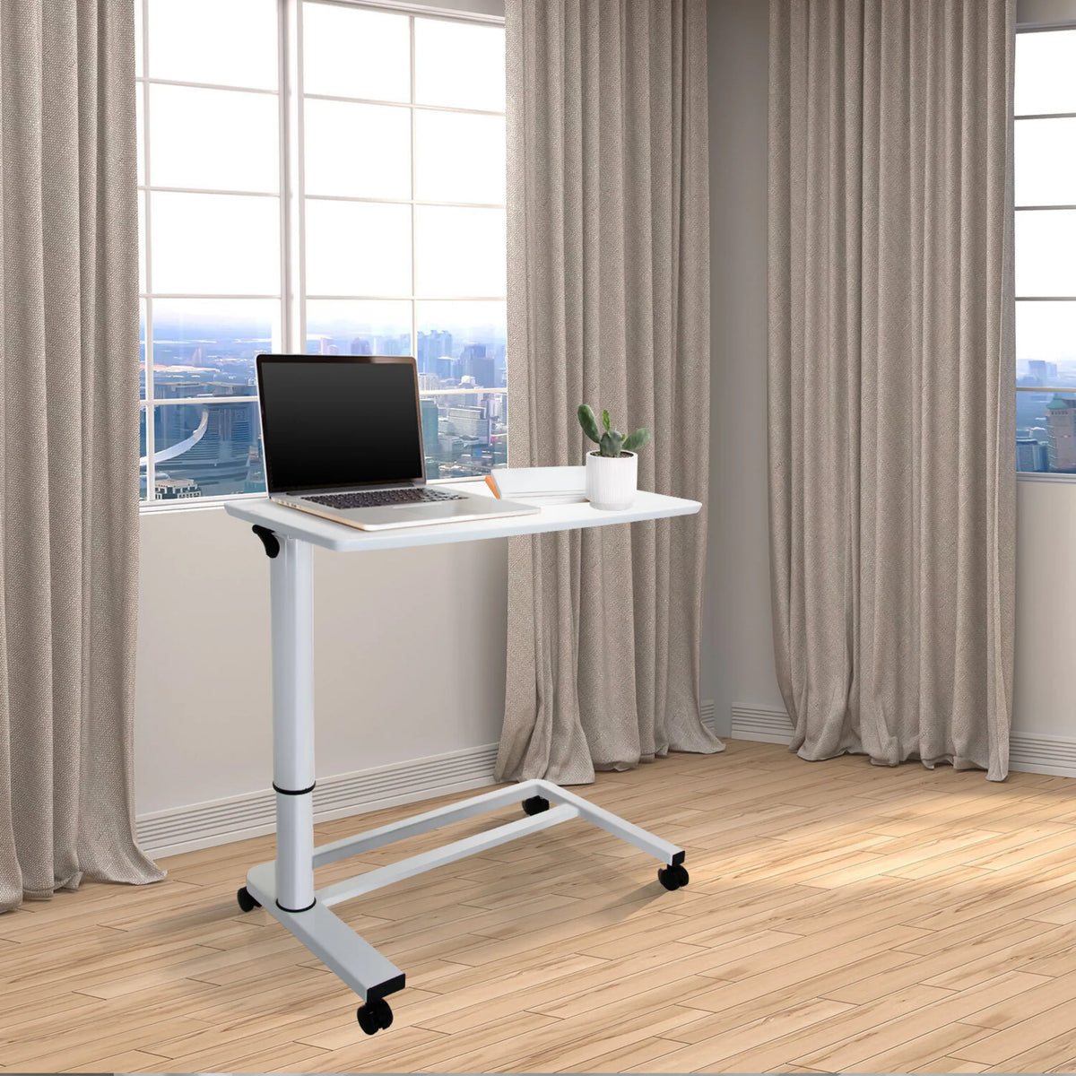 Bureau assis-debout blanc STAND II avec roulettes et ordinateur portable sur un sol en bois clair de hjh OFFICE