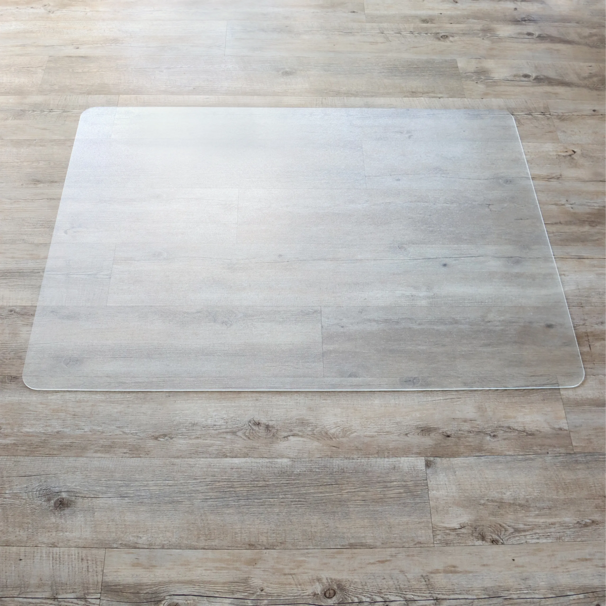 Tapis de sol transparent PUNOMAT pour sols durs au format 120 x 90 cm de Kottig