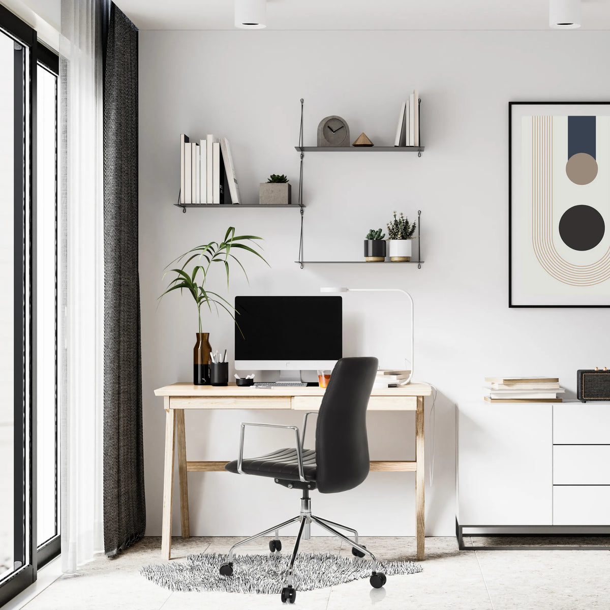 Luxus-Chefsessel VEMONA 30 in Schwarz mit Armlehnen und Rollen an einem Schreibtisch von hjh OFFICE