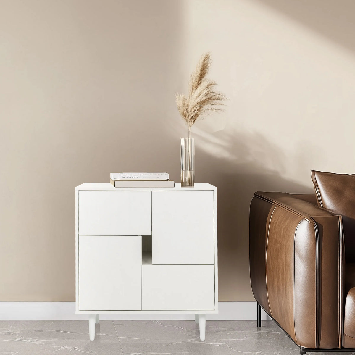 Commode blanche LYKKJA avec façade asymétrique et quatre pieds de hjh LIVING