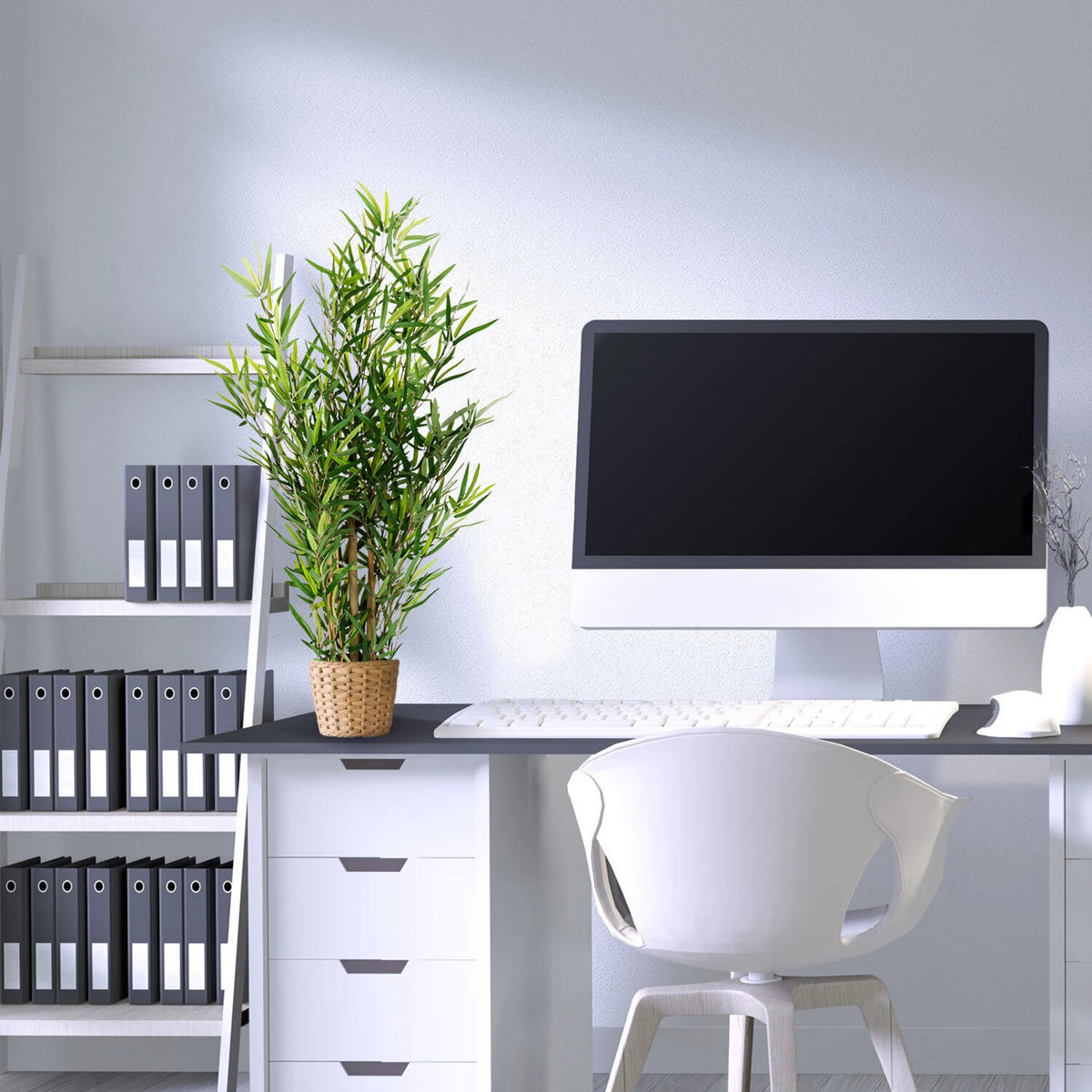 Plante artificielle MINI BAMBUS de couleur verte avec pot en panier tressé de hjh OFFICE
