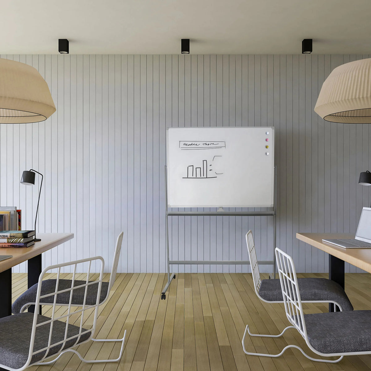 Tableau blanc MULTIBOARD I en blanc et argent sur un support à roulettes dans un bureau moderne de hjh OFFICE