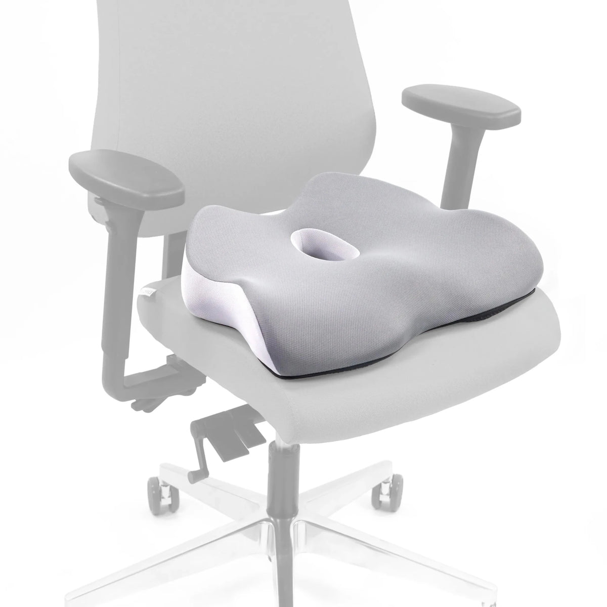 Coussin de siège MEDISIT IV gris avec une ouverture centrale sur une chaise de bureau de hjh OFFICE