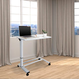 Bureau assis-debout blanc STAND II avec roulettes et ordinateur portable sur un sol en bois clair de hjh OFFICE
