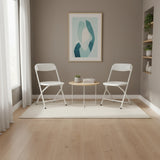 Deux chaises d'extérieur TUDELA XXL PRO W blanches avec une table d'appoint ronde dans une pièce au style moderne de hjh OFFICE