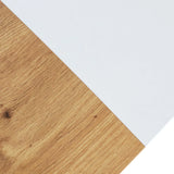 Transition de matériau entre la surface blanche et le décor en chêne du bureau réglable en hauteur électriquement STAND T3 de hjh OFFICE