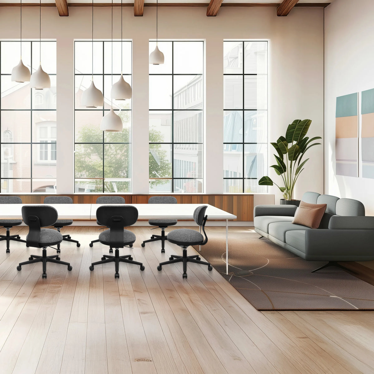 Siège de bureau à domicile SITMOTION B gris avec roulettes et accoudoirs dans un bureau lumineux de hjh OFFICE