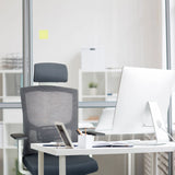 Siège de bureau de qualité professionnelle CAPTIVO BASE W gris avec dossier en maille et appui-tête à un bureau de hjh OFFICE