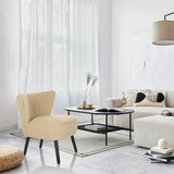 Beiger Loungesessel MANISO mit schwarzen Beinen in einem modern eingerichteten Raum von hjh LIVING