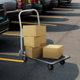 Chariot à plateforme CARRY bleu et blanc avec trois cartons chargés sur un parking de hjh OFFICE