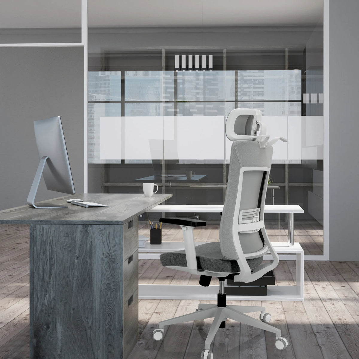 Siège de bureau de qualité professionnelle COMFIO WMH gris avec appuie-tête et accoudoirs à un bureau de hjh OFFICE