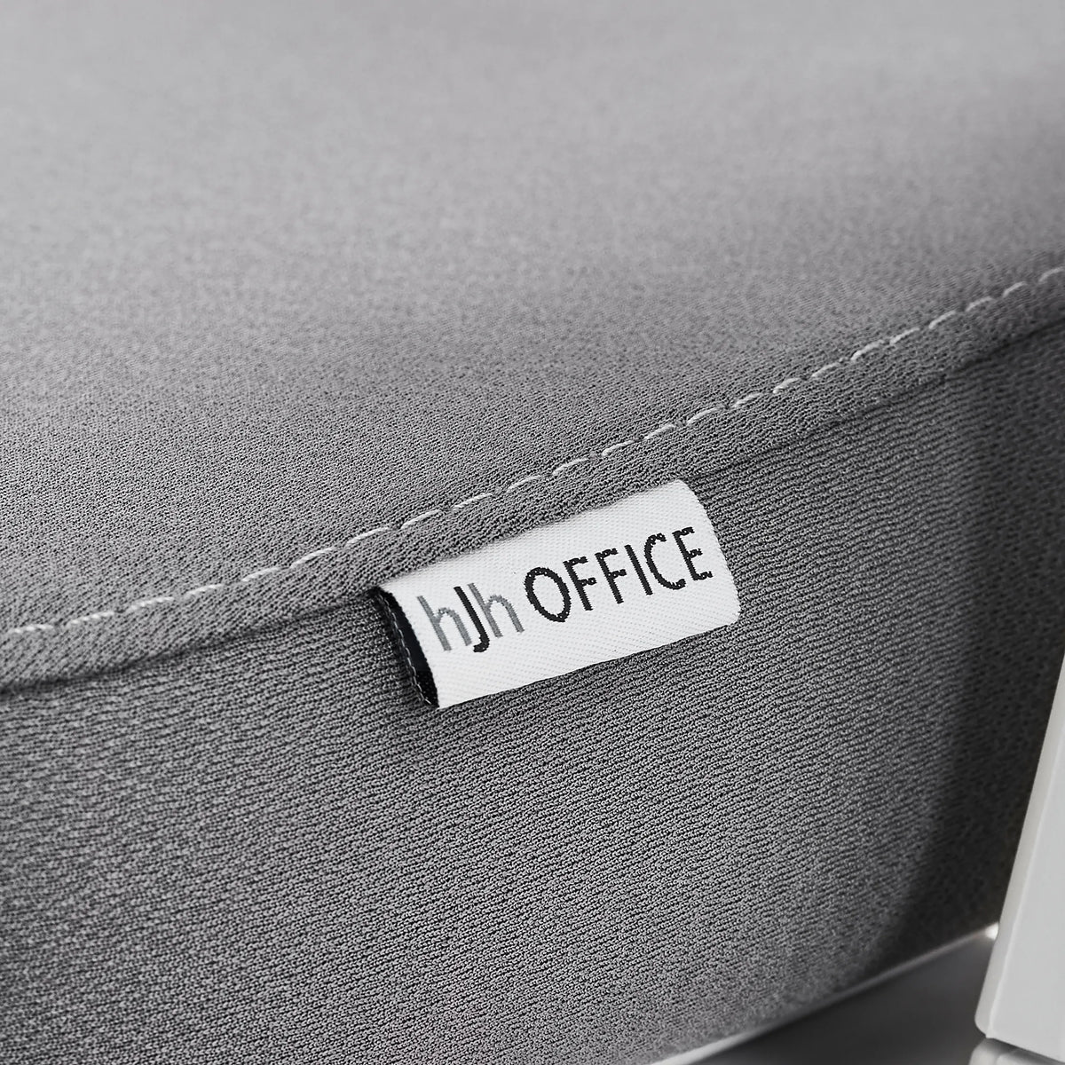Étiquette de marque sur le revêtement en tissu gris du siège de bureau de qualité professionnelle Ergomy WF 2 de hjh OFFICE