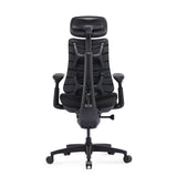 Vue arrière du siège de bureau haut de gamme LiberNovo Omni SE en noir avec appui-tête et cinq roulettes en étoile de Libernovo