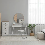 Chaise pliante TUDELA BASIC grise en PVC dans une pièce lumineuse avec une coiffeuse blanche de hjh OFFICE