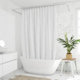 Plante artificielle verte CHAMAEDOREA dans un panier tressé sur un tabouret blanc de hjh OFFICE
