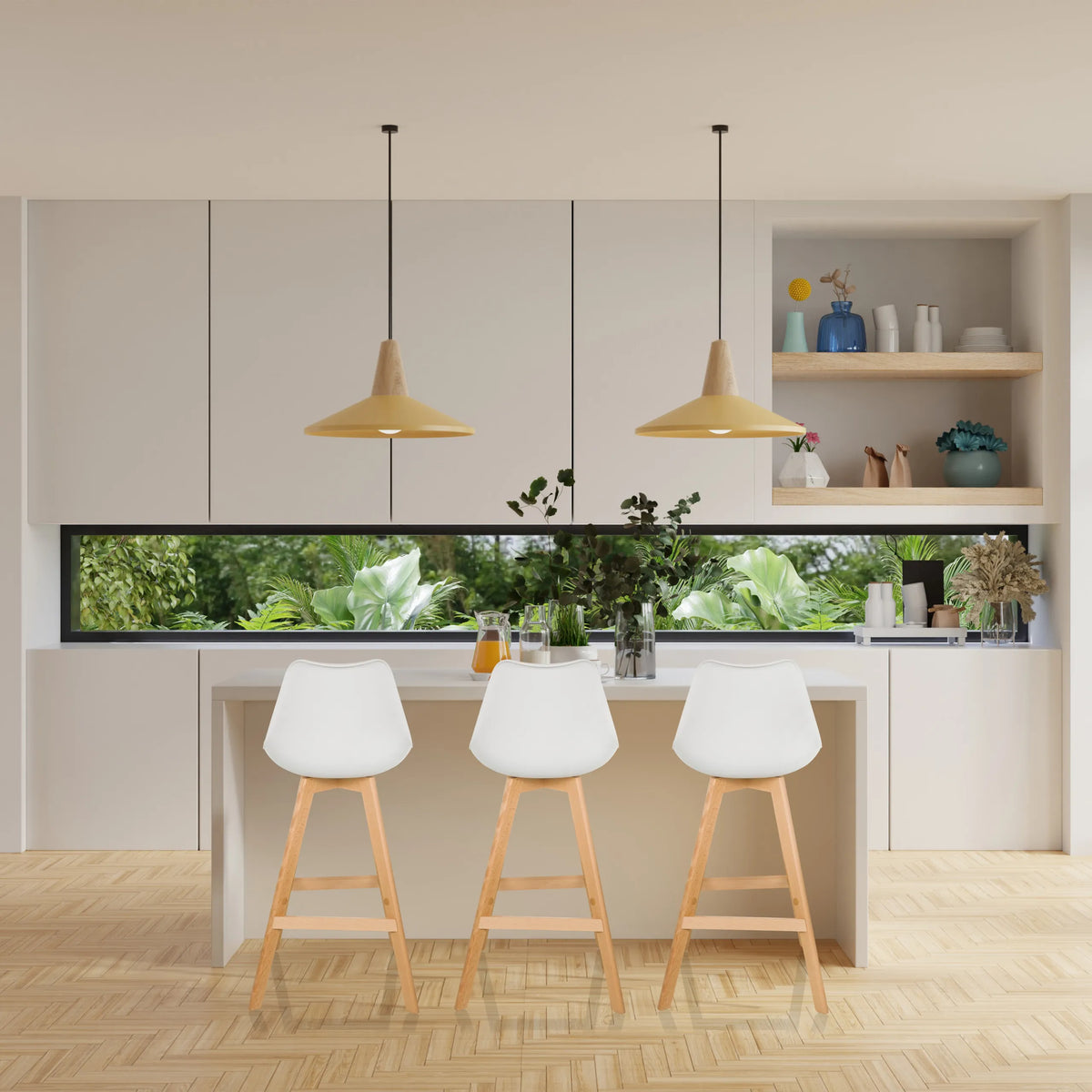 Trois tabourets de bar SCANDI HIGH blancs avec des pieds en bois clair à un îlot de cuisine de hjh LIVING
