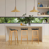 Trois tabourets de bar LONSO W avec piètement en chêne et assises noires de hjh OFFICE