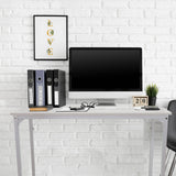 Weißer Schreibtisch WORKSPACE I mit Maßen von 100 × 50 cm vor einer weißen Ziegelwand von hjh OFFICE
