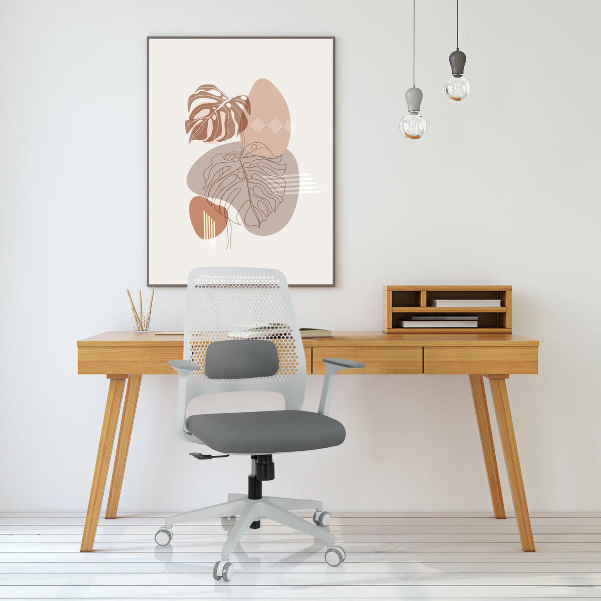 Siège de bureau à domicile PARFERIO W gris avec dossier en maille et roulettes devant un bureau de hjh OFFICE