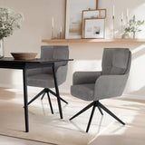 Zwei graue Polsterstühle TARUGO mit schwarzen Sternfüßen an einem schwarzen Tisch von hjh LIVING