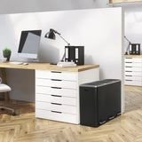 Poubelle noire Clean 9 avec deux compartiments à côté d'un bureau de hjh OFFICE