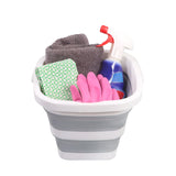 Conteneur pliable CLEAN SILE gris et blanc avec des articles de nettoyage tels que des chiffons, des gants et un vaporisateur de hjh OFFICE