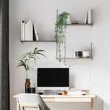 Plante artificielle verte EUCALYPTUS CLIMB dans un vase marron sur un bureau de hjh OFFICE