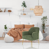 Fauteuil de salon THASSOS vert avec pieds dorés dans une chambre lumineuse de hjh LIVING