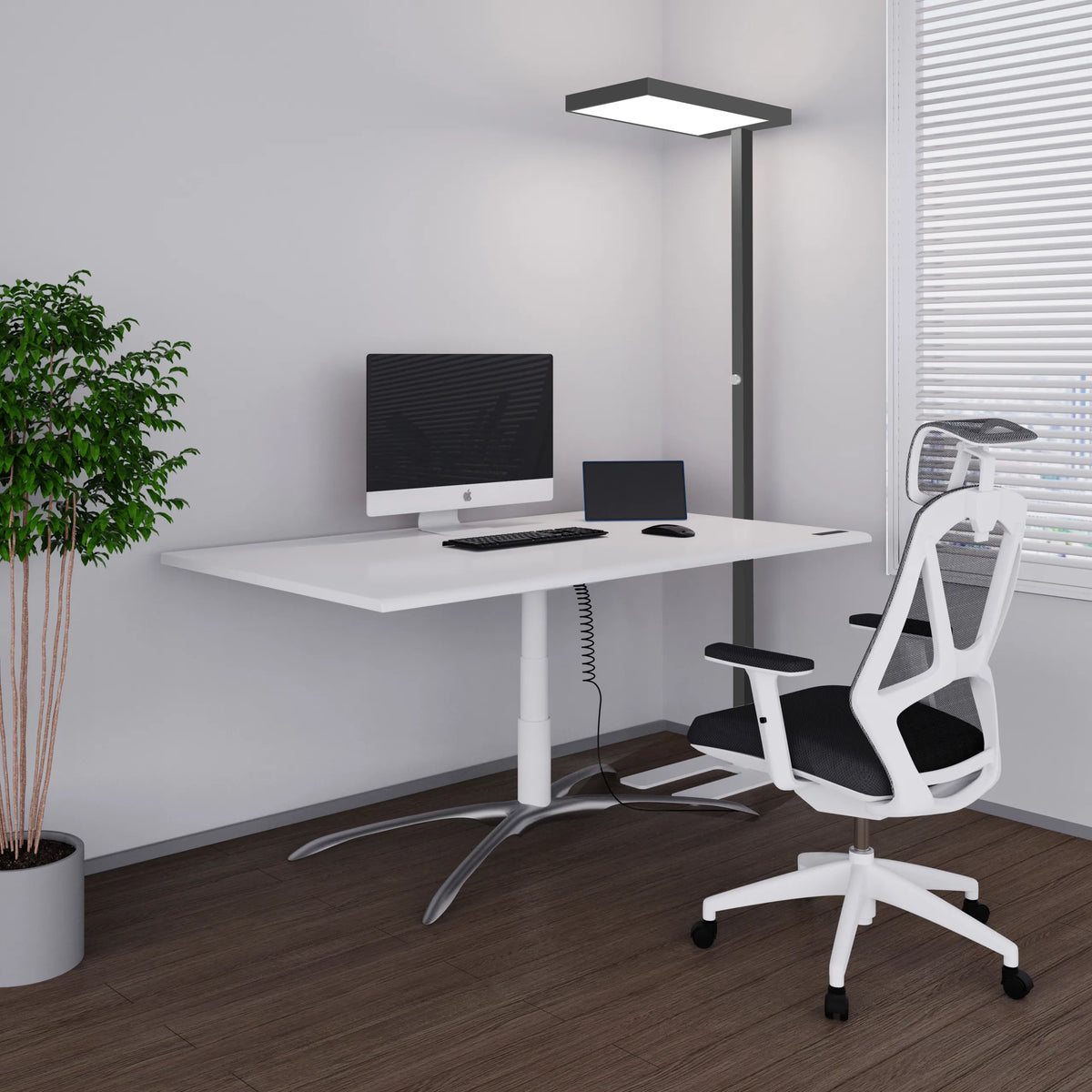 Lampadaire LED noir LUMANOVA à côté d'un bureau blanc de hjh OFFICE