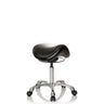 Tabouret de selle ORTHO SIT noir avec assise rembourrée et piètement cruciforme chromé sur roulettes de hjh OFFICE