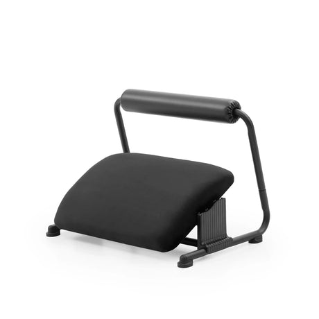 Repose-pieds noir Podi Velvet avec surface rembourrée et un rouleau cylindrique de hjh OFFICE